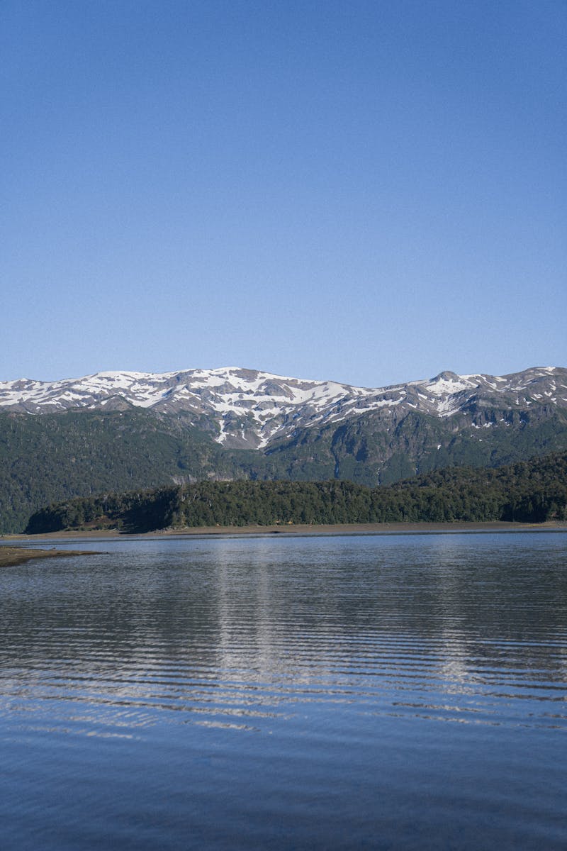 A tranquil lake with mountain reflections
